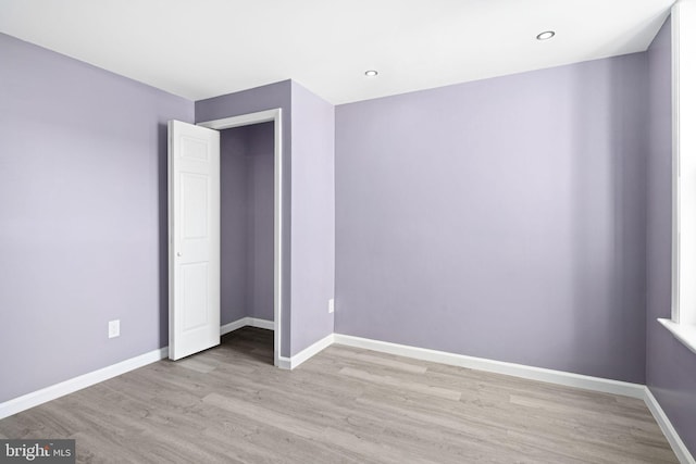 unfurnished bedroom featuring light hardwood / wood-style flooring