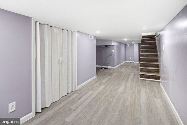 basement with light wood-type flooring