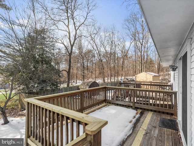 view of snow covered deck