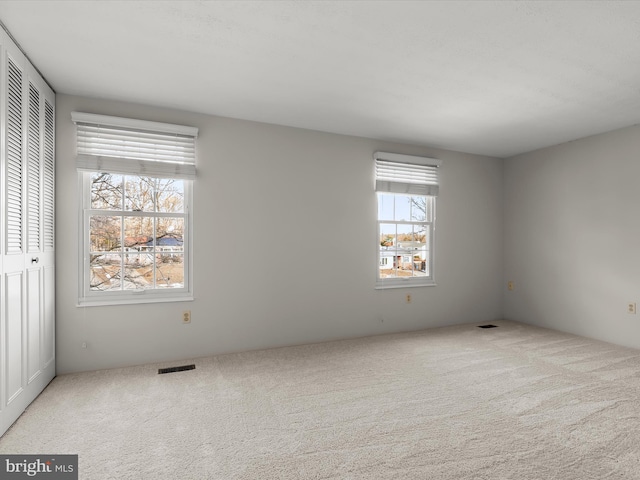 view of carpeted spare room