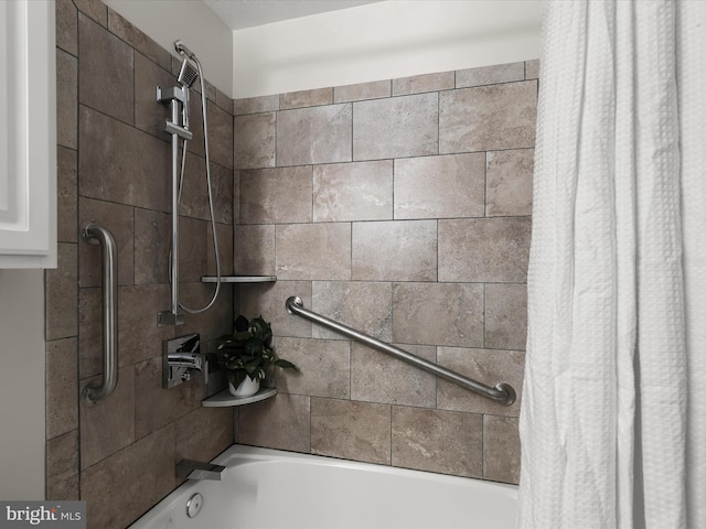 bathroom with shower / bathtub combination with curtain