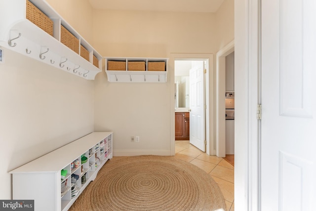 mudroom featuring light tile patterned floors