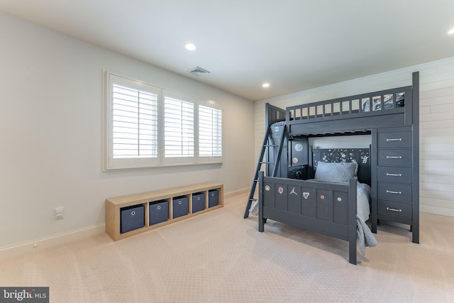 carpeted bedroom featuring recessed lighting, visible vents, and baseboards