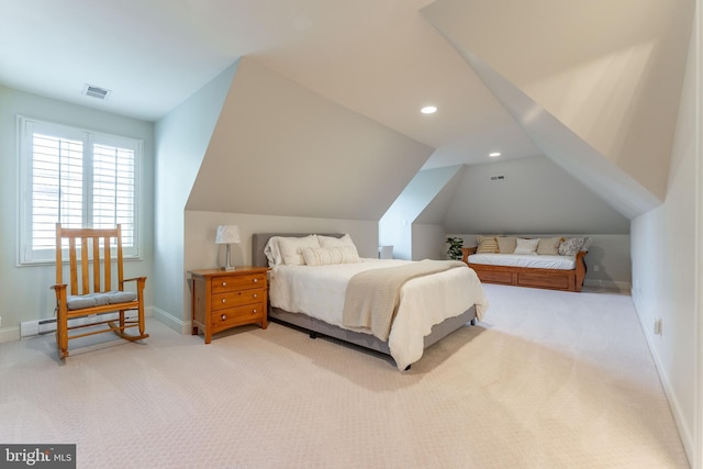 carpeted bedroom with visible vents, baseboards, and vaulted ceiling