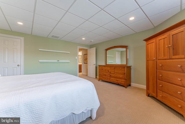 bedroom with recessed lighting, visible vents, light carpet, and baseboards