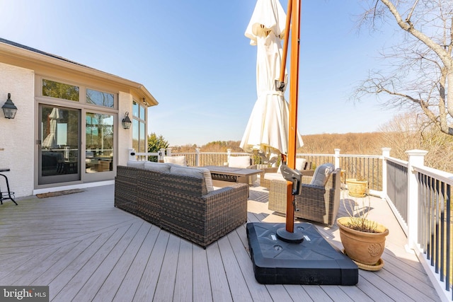 deck featuring an outdoor living space