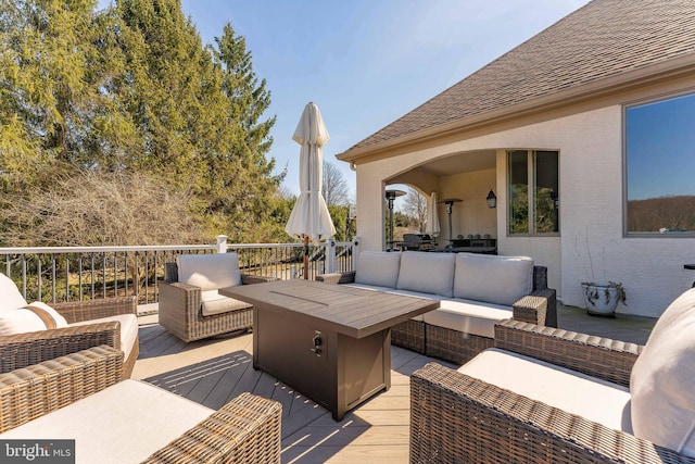 deck with an outdoor hangout area