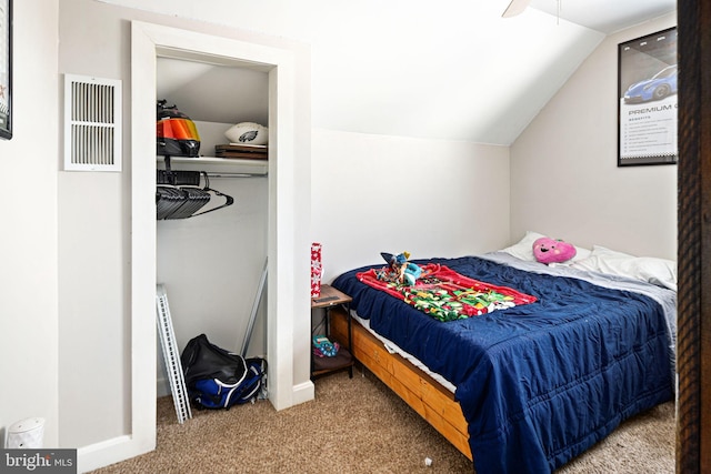 bedroom featuring ceiling fan, lofted ceiling, and carpet flooring