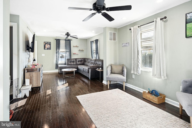 living room with dark hardwood / wood-style floors