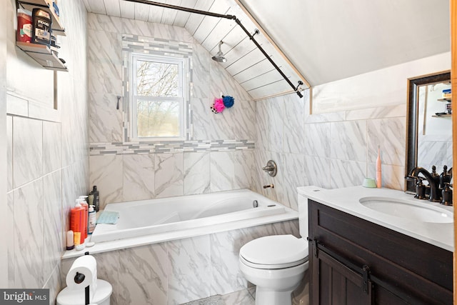 full bathroom with vaulted ceiling, tile walls, tiled shower / bath combo, vanity, and toilet