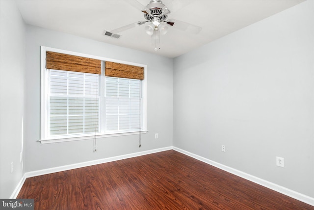 unfurnished room with hardwood / wood-style flooring and ceiling fan