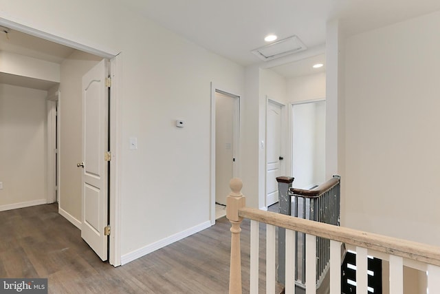 hall with dark wood-type flooring