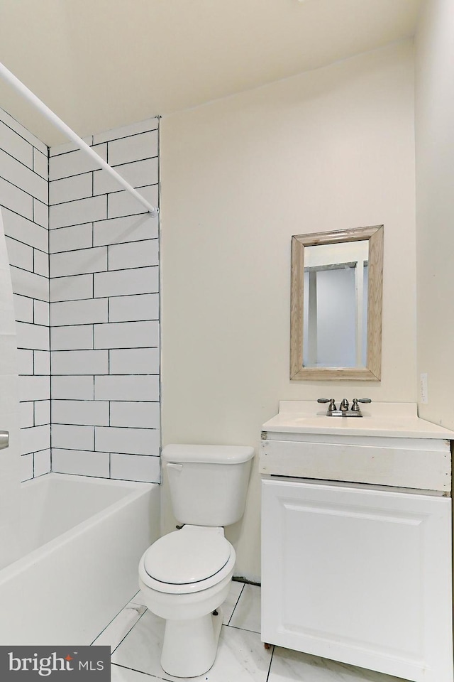 full bathroom with vanity, toilet, tiled shower / bath combo, and tile patterned flooring