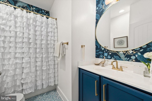 bathroom with vanity and toilet