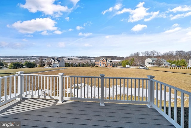 wooden deck with a yard