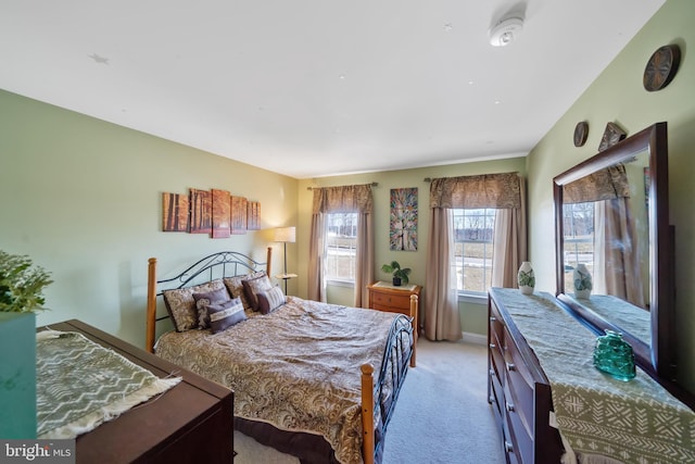 bedroom with light carpet