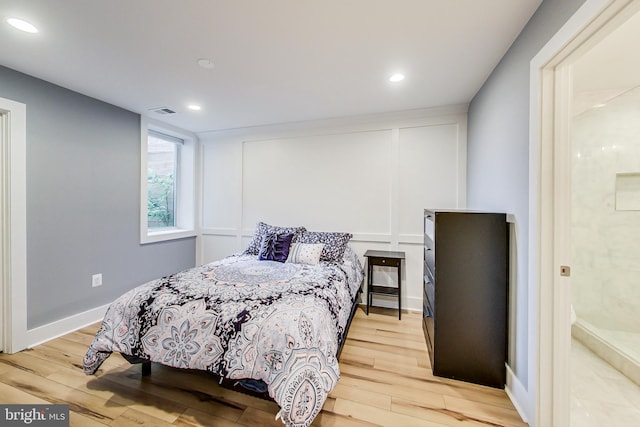 bedroom featuring light hardwood / wood-style floors