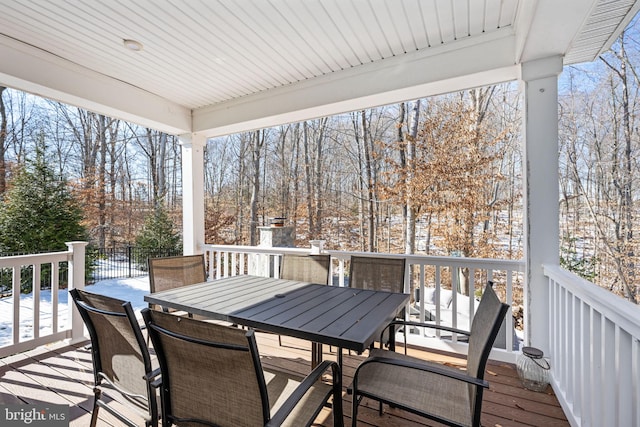 view of snow covered deck