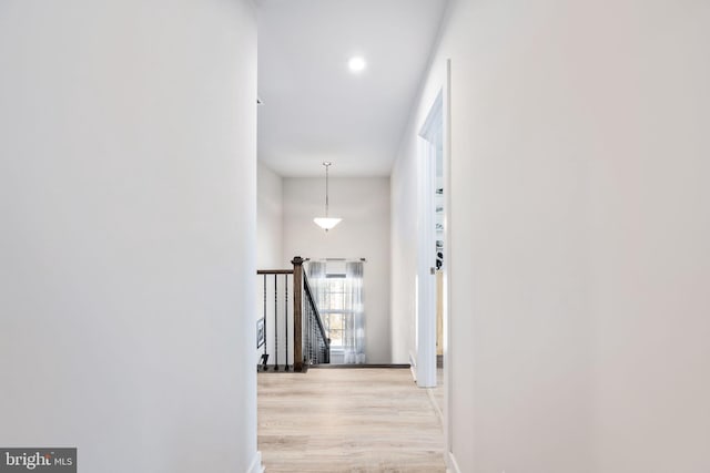 hallway featuring light wood-type flooring