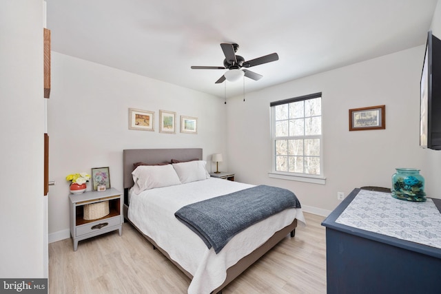 bedroom featuring ceiling fan and light hardwood / wood-style floors