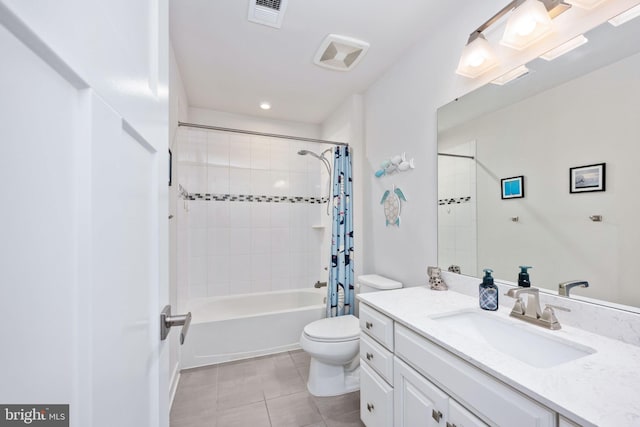 full bathroom featuring shower / bathtub combination with curtain, vanity, tile patterned floors, and toilet