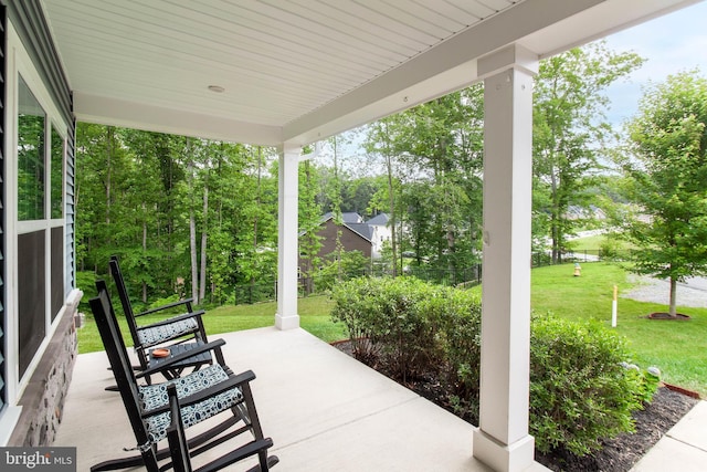 view of patio featuring a porch