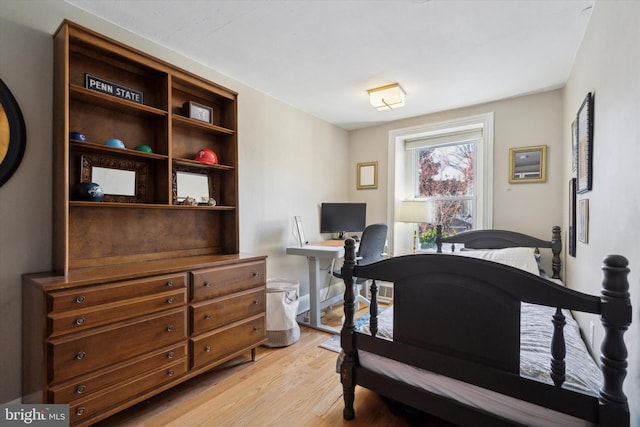 bedroom with light hardwood / wood-style floors