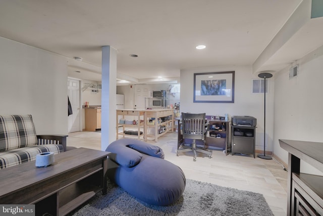 interior space with baseboards, visible vents, and recessed lighting