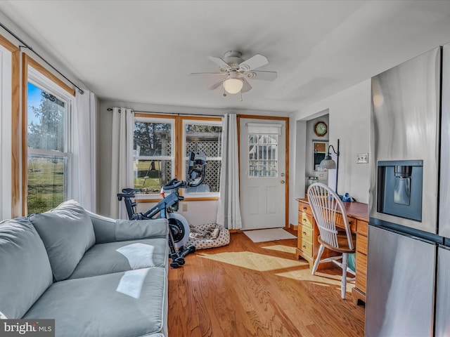 interior space featuring ceiling fan and light wood-type flooring