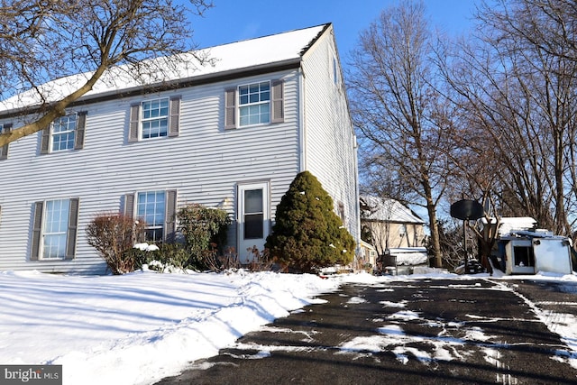 view of snow covered property