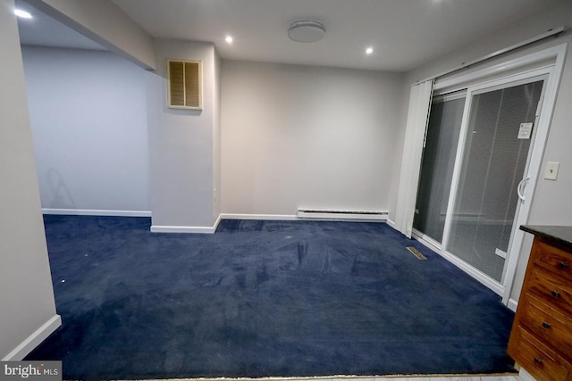 interior space with a baseboard radiator and dark carpet