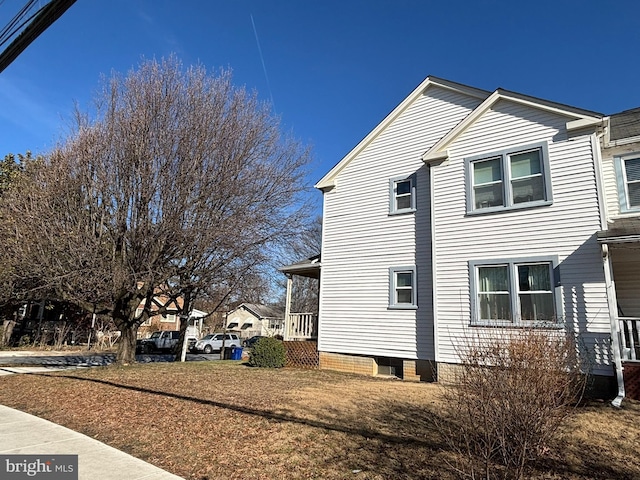 view of home's exterior featuring a porch