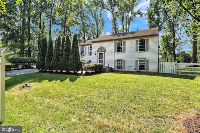 view of front of home with a front yard