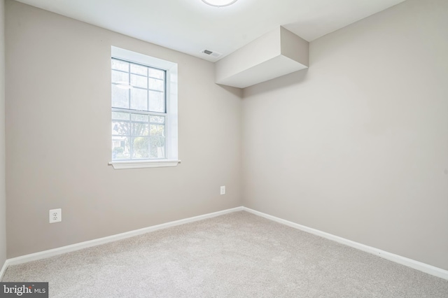 view of carpeted spare room