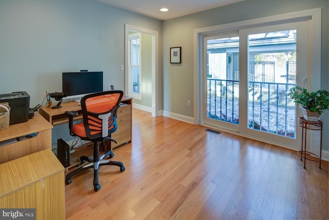 office with hardwood / wood-style floors