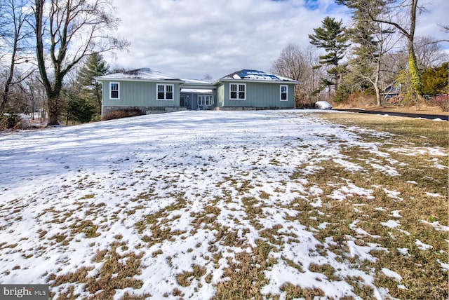 view of snow covered property