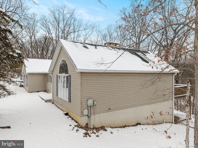 view of snow covered property