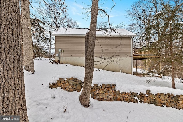 view of snow covered property