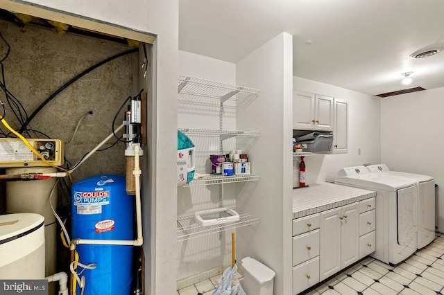 washroom featuring washing machine and clothes dryer