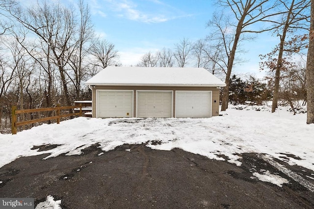 view of snow covered garage