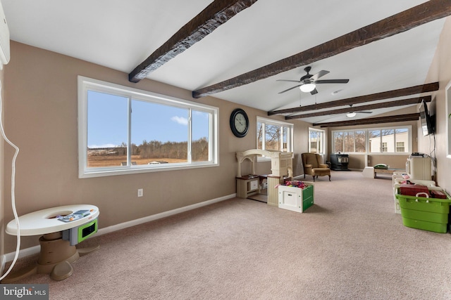 game room featuring lofted ceiling with beams, carpet, and ceiling fan