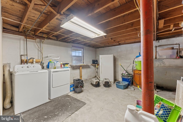 basement with separate washer and dryer