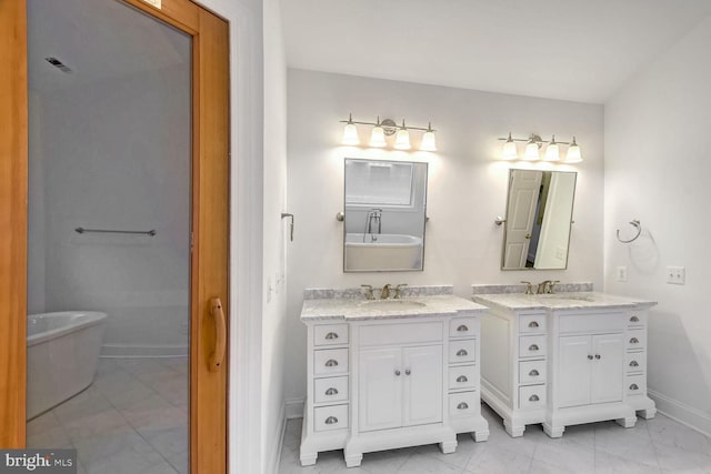 bathroom featuring vanity and a bathtub