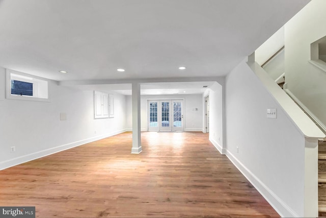 basement featuring light wood-type flooring