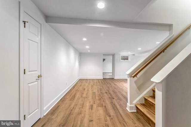 hall with light wood-type flooring