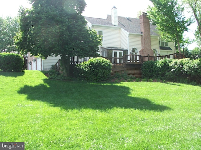 view of yard with a deck