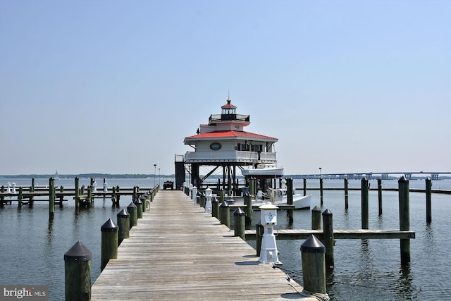 dock area featuring a water view