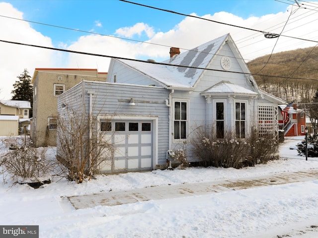 exterior space with a garage