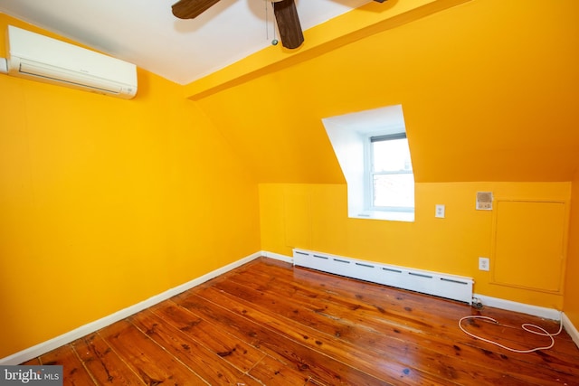 bonus room with lofted ceiling, hardwood / wood-style flooring, ceiling fan, baseboard heating, and a wall unit AC