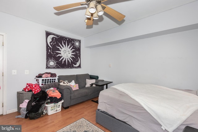 bedroom featuring light hardwood / wood-style flooring and ceiling fan